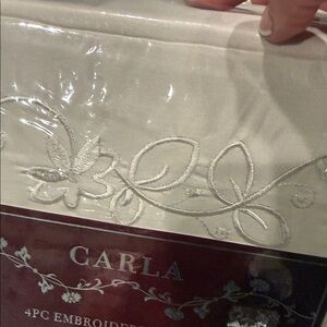 New king 4 pc embroidered sheets. Tan in color  Carla brand.